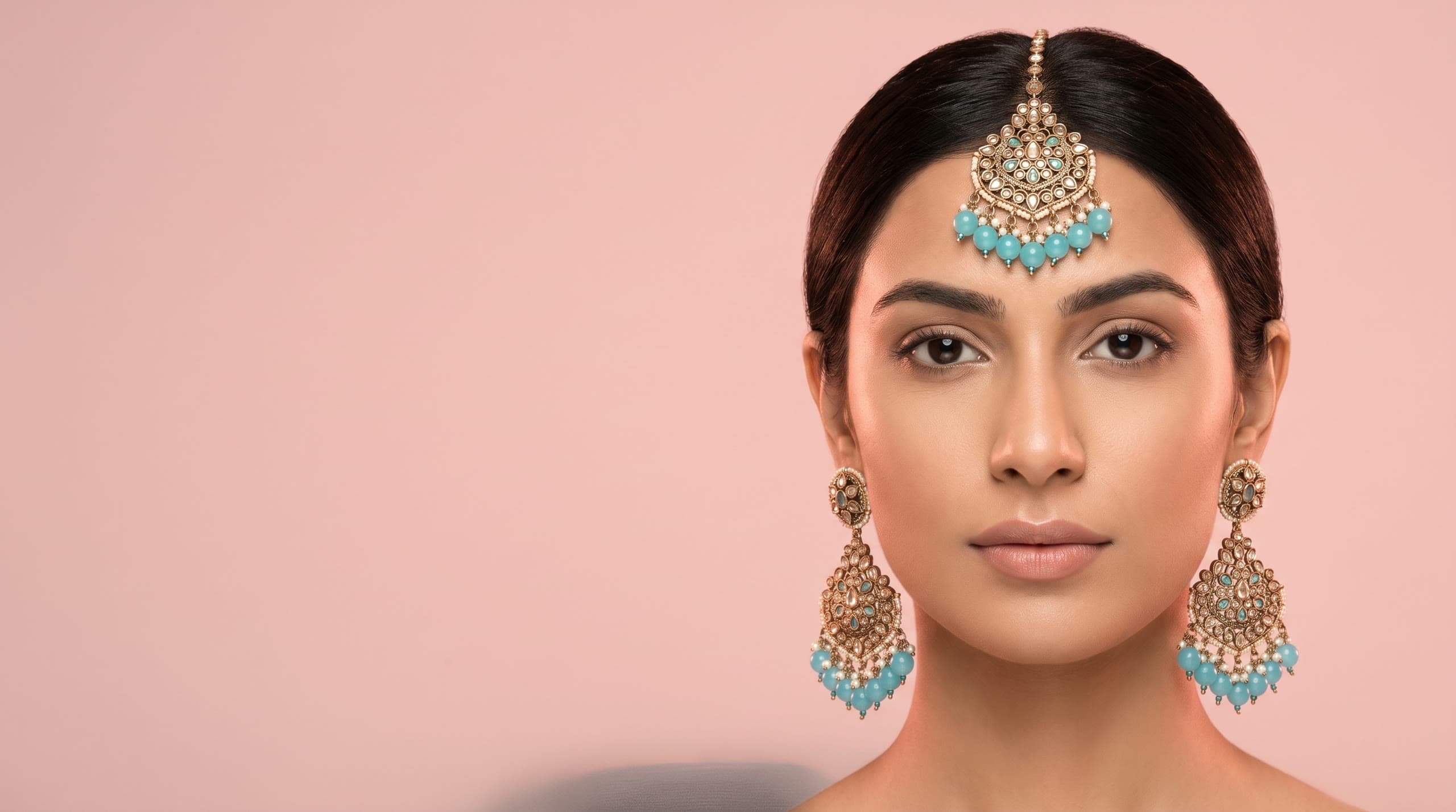 The Aqua Heirloom maang tikka and earrings
