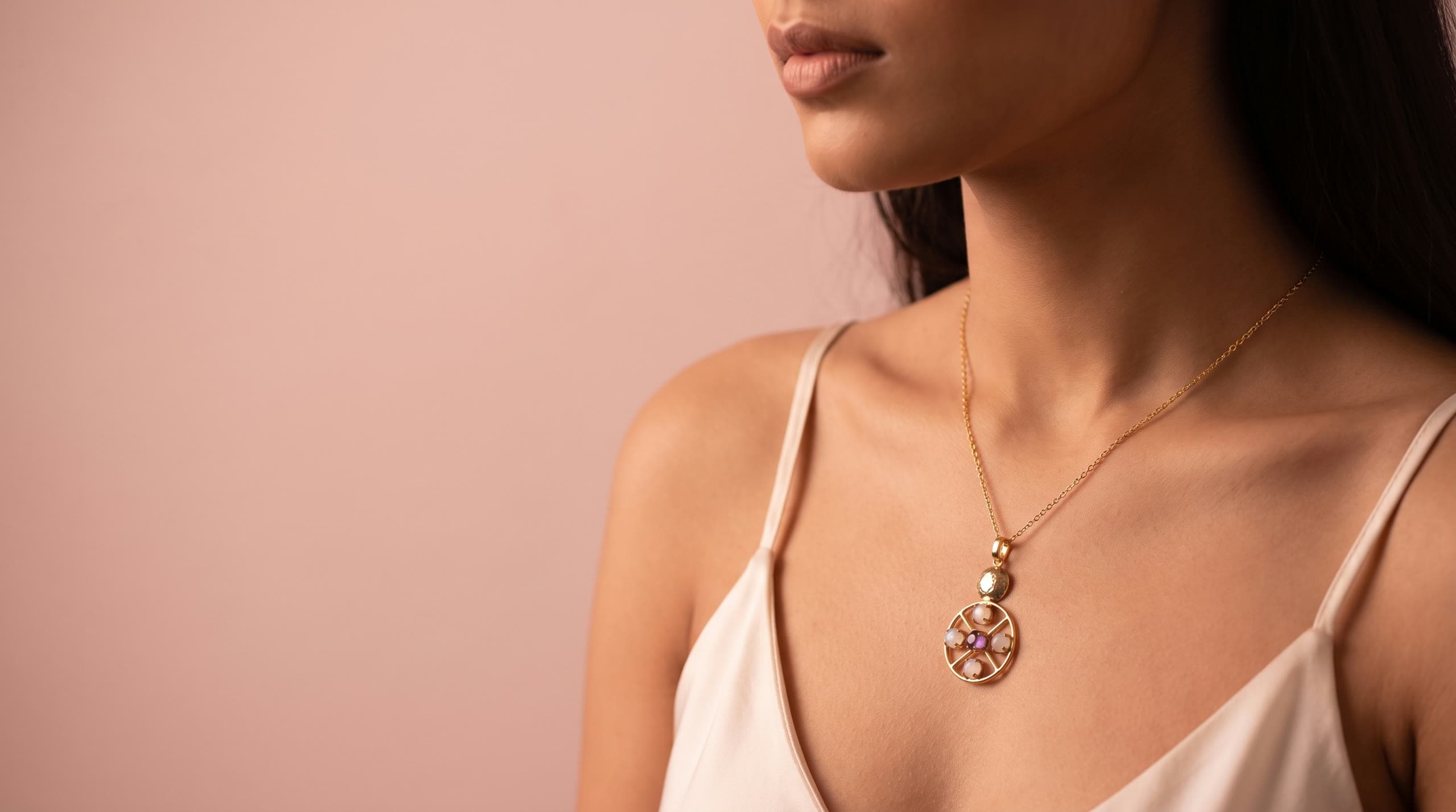 The Lunar Amethyst pendant on a fine gold chain